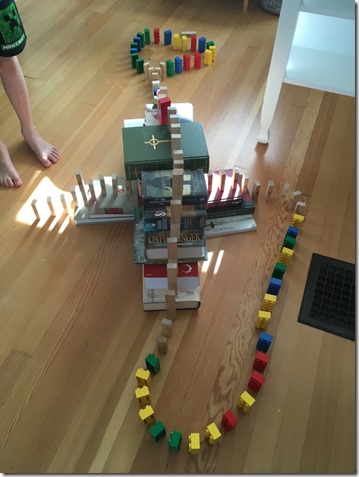 Jenga and Large Lego about to fall
